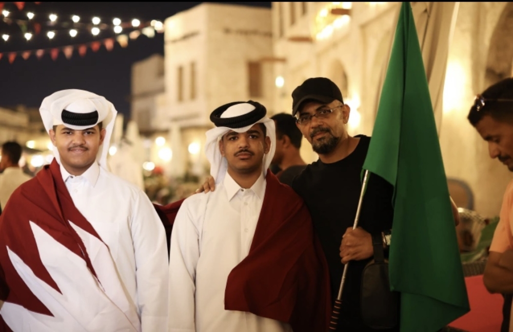 Fans from different countries have been gathering at Souq Waqif with their respective flags [Showkat Shafi/Al Jazeera]
