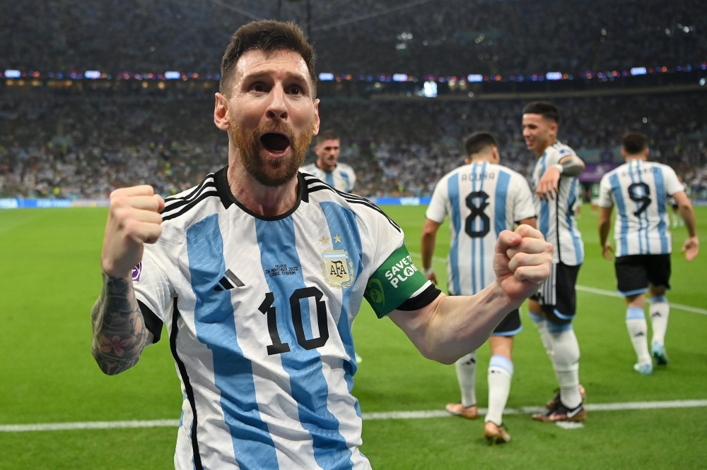 Messi celebrates his goal during the game. Superb goals by Lionel Messi and Enzo Fernandez have earned Argentina a 2-0 win over Mexico in a pulsating atmosphere at Lusail Stadium on Saturday.