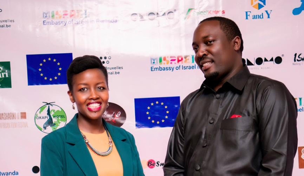 Festival Executive Director Tresor Senga (R) with ICT Minister Paula Ingabire during the opening of Mashariki African Film Festival Saturday, November 26, at Century Cinema-courtesy 