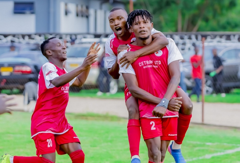 Musanze FC’s Peter Agblevor (NO 2) with his teammates celebrate his goal as they beat Rayon Sport in Musanze on Sunday, November 27. Photo by Christophe Renzaho.