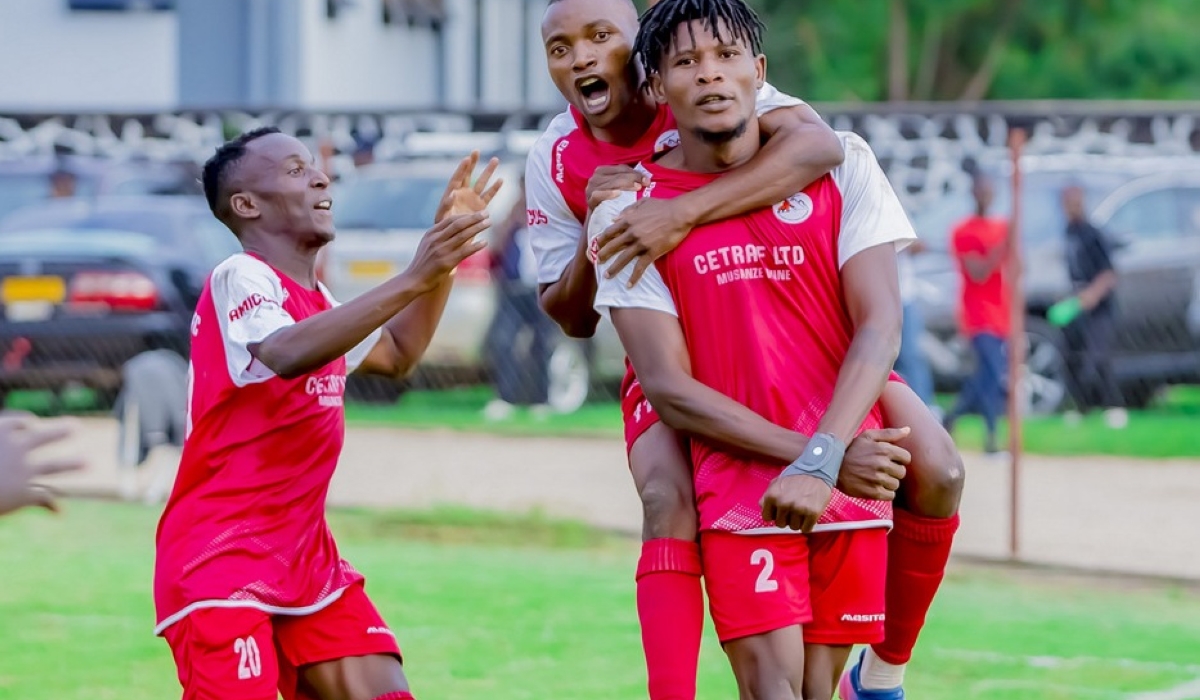 Musanze FC’s Peter Agblevor (NO 2) with his teammates celebrate his goal as they beat Rayon Sport in Musanze on Sunday, November 27. Photo by Christophe Renzaho.