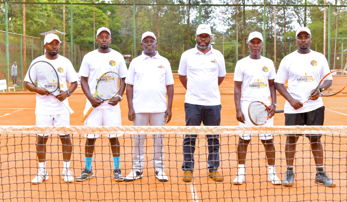 Officials in a group photo with some of 125 players at the sixth edition of Cogebanque Tennis Open that launched on December 25. Photos: Courtsesy.