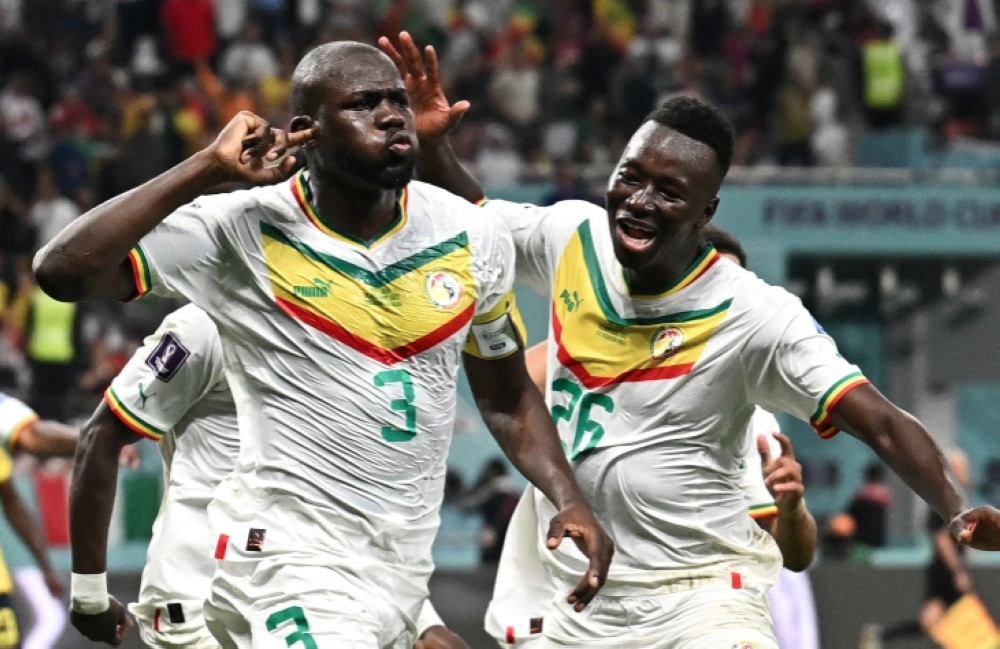 Senegal&#039;s Kalidou Koulibaly celebrates scoring his side&#039;s second goal against Ecuador [Dylan Martinez/Reuters]
