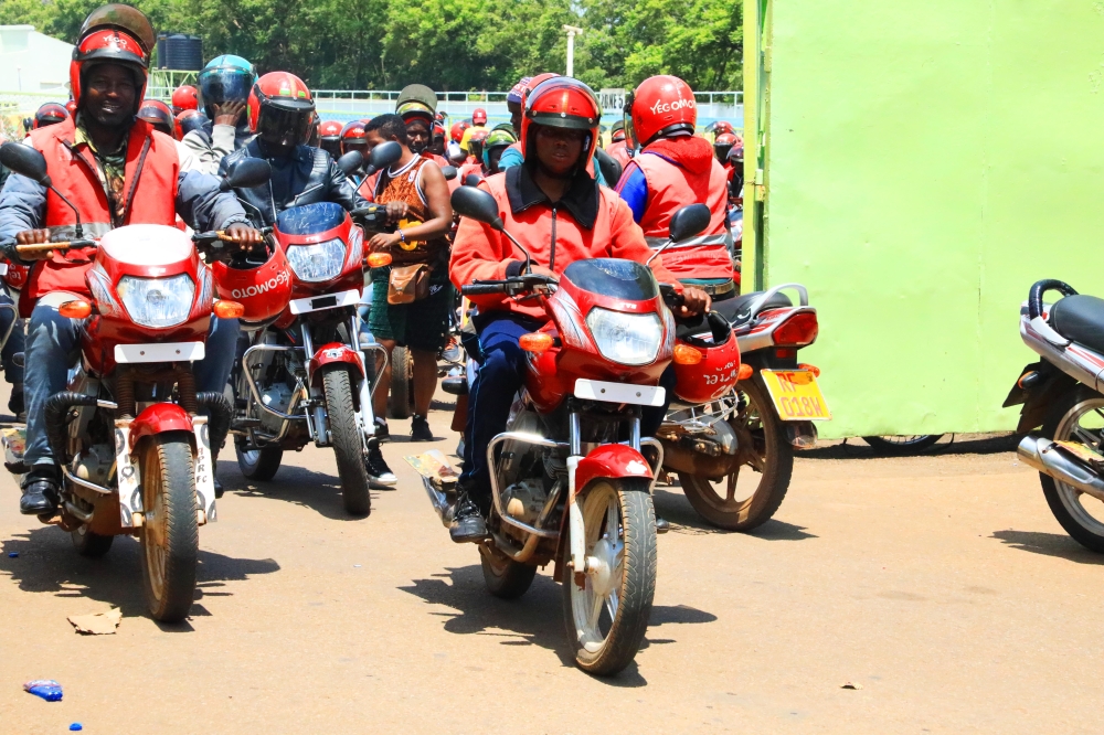 Taxi-moto operators after a meeting with RURA officials at Kigali Stadium on November 14. Craish Bahizi