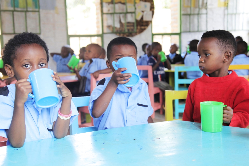 Children take porridge at Mageragere Early Childhood Development Center in Nyarugenge District. Photo by Sam Ngendahimana