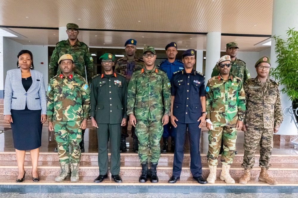 Both delegations pose for a group photo at RDF headquarters in Kigali on December 1. Courtesy