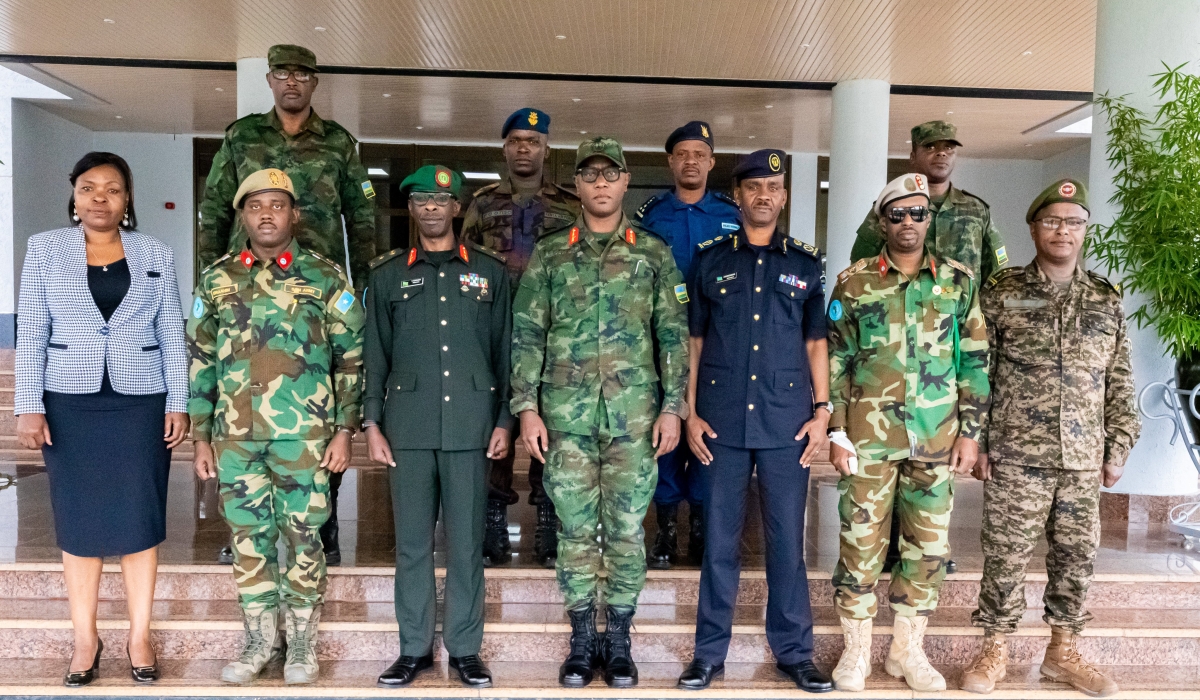 Both delegations pose for a group photo at RDF headquarters in Kigali on December 1. Courtesy