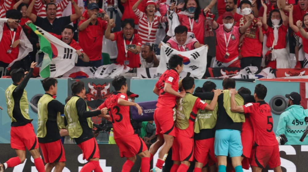 South Korea&#039;s Hwang Heechan celebrates their winning goal [Pedro Nunes/Reuters]
