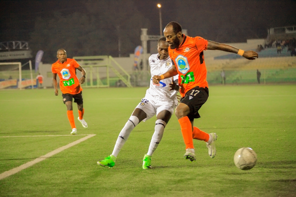Gasogi United and APR FC players vie for the ball during a goalless draw at Kigali Stadium on December 2. Courtesy