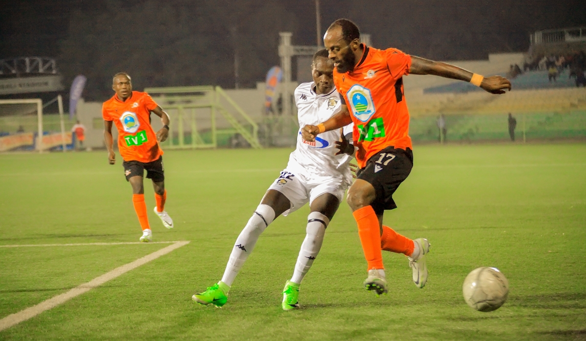 Gasogi United and APR FC players vie for the ball during a goalless draw at Kigali Stadium on December 2. Courtesy