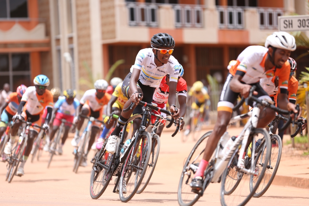 Janvier Rugamba and Yves Nkurunziza lead the peloton during Rwanda Cycling Cup race dubbed " Memorial Byemayire Lambert" in Huye District. FERWACY has signed agreement with partners to have three races in December. Photo Sam Ngendahimana