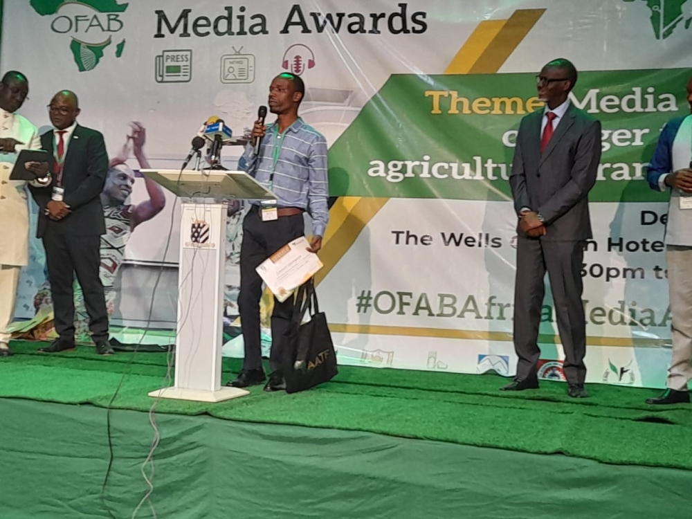 The New Times&#039; senior reporter Emmanuel Ntirenganya speaks at the event after receiving the award. Ntirenganya was announced the best agricultural biotechnology reporter on the continent during an awards ceremony in Abuja, Nigeria on Friday, December 2. Courtesy