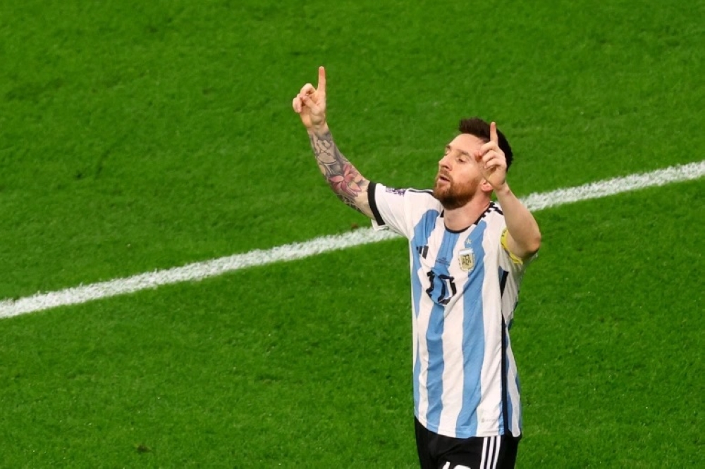 Lionel Messi celebrates [Paul Childs/Reuters]