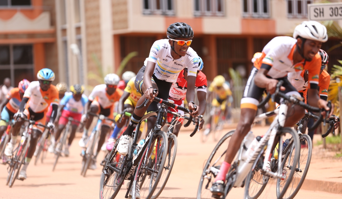 Janvier Rugamba and Yves Nkurunziza lead the peloton during Rwanda Cycling Cup race dubbed " Memorial Byemayire Lambert" in Huye District. FERWACY has signed agreement with partners to have three races in December. Photo Sam Ngendahimana