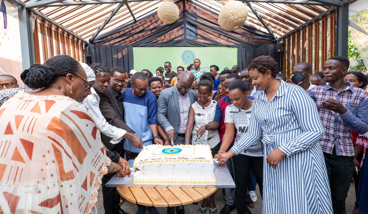 Officials and the attendees cut a cake for celebration during the fourth edition of the Sharing Joy Conference