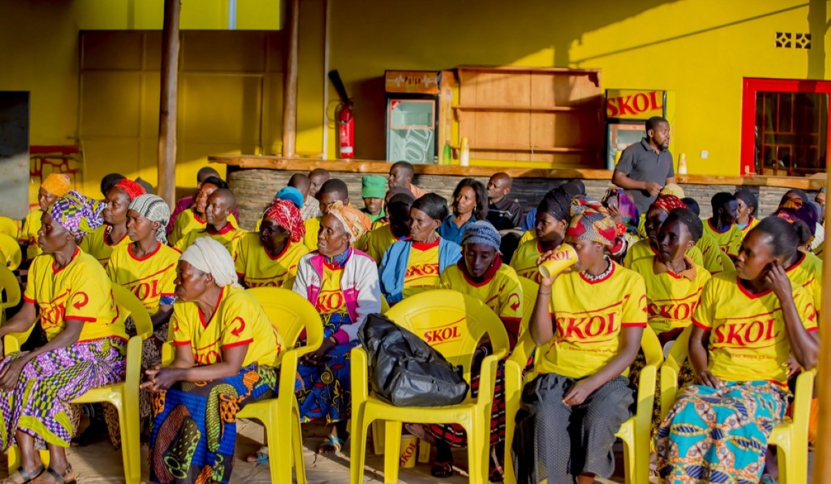 Some of  over 120 families living in the brewery’s neighborhood in Nzove who are beneficiaries of  health insurance donated by SKOL Brewery Ltd &#039;s support, on Friday, December 2. Courtesy