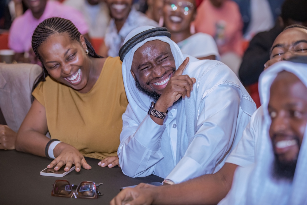 Attendees laugh as Patrick Rusine makes a joke during the 2022 Seka Fest held Sunday, December 4, at Kigali Convention Center. All Photos by Dan Gatsinzi Kwizera