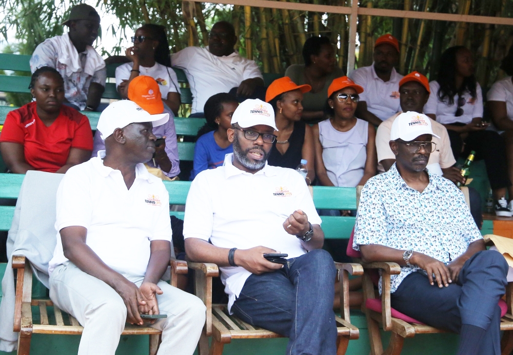 (L-R) President of Rwanda Tennis Federation Karenzi,  Guillaume Habarugira, Chief Executive Officer of Cogebanque Plc watch the game at Cercle Sportif Tennis courts. All photos by Craish Bahizi