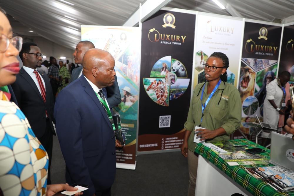 Delegates during a guided tour of exhibition at the tourism business conference and Rwanda tourism week exhibition. All photos by Craish Bahizi