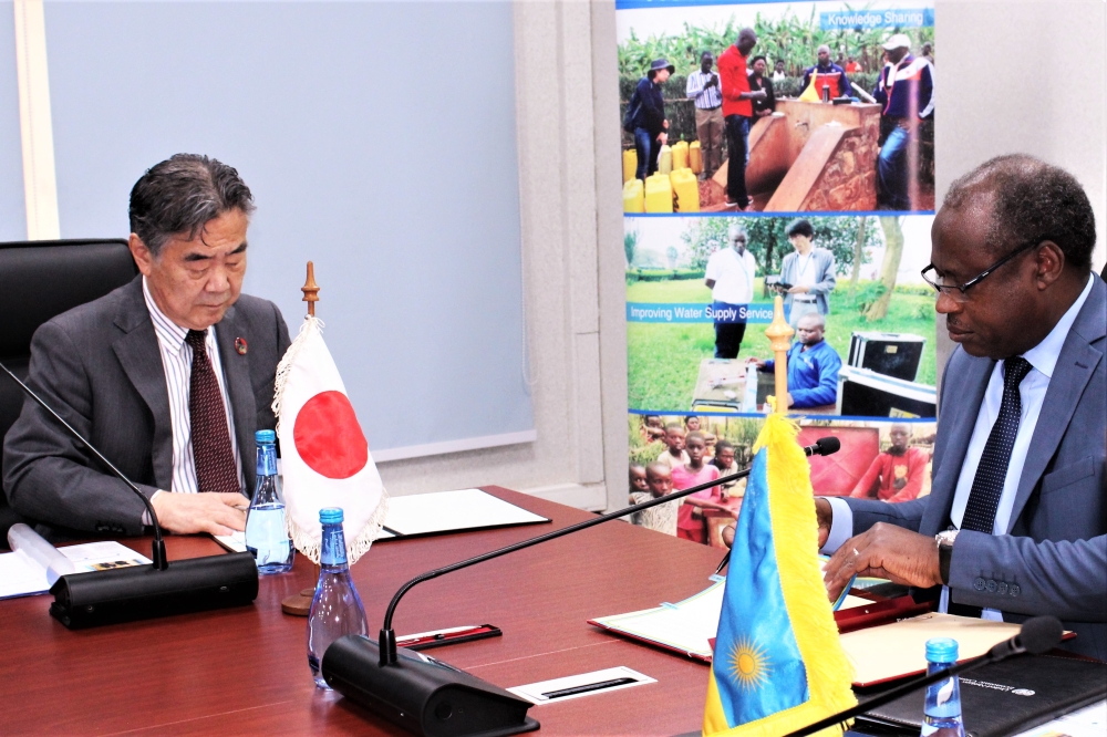  Minister of Finance and Economic planning   Uzziel Ndagijimana   and  Imai Masahiro, Ambassador of Japan in Rwanda  sign the agreement in Kigali on Tuesday, December 6. Courtesy