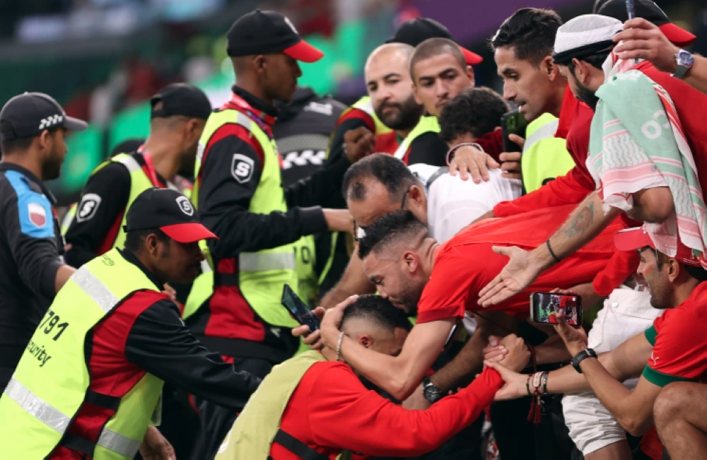 Celebrations after the penalty shootout win over Spain [Showkat Shafi/Al Jazeera]