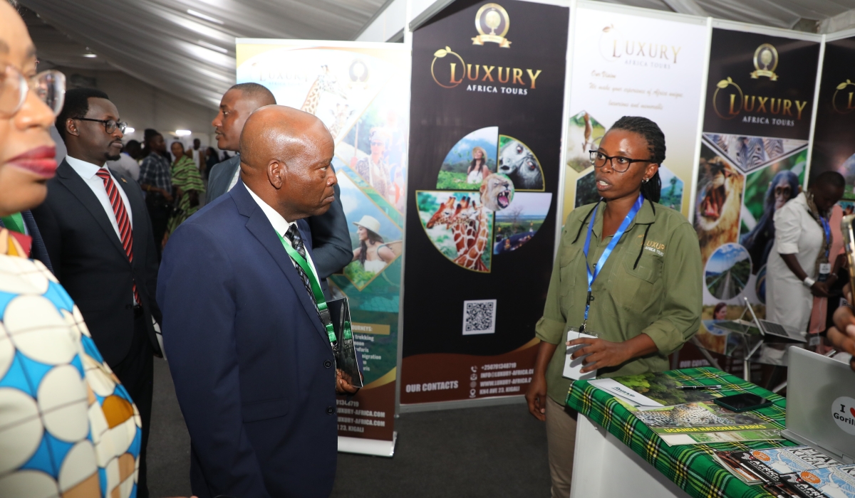 Delegates during a guided tour of exhibition at the tourism business conference and Rwanda tourism week exhibition. All photos by Craish Bahizi