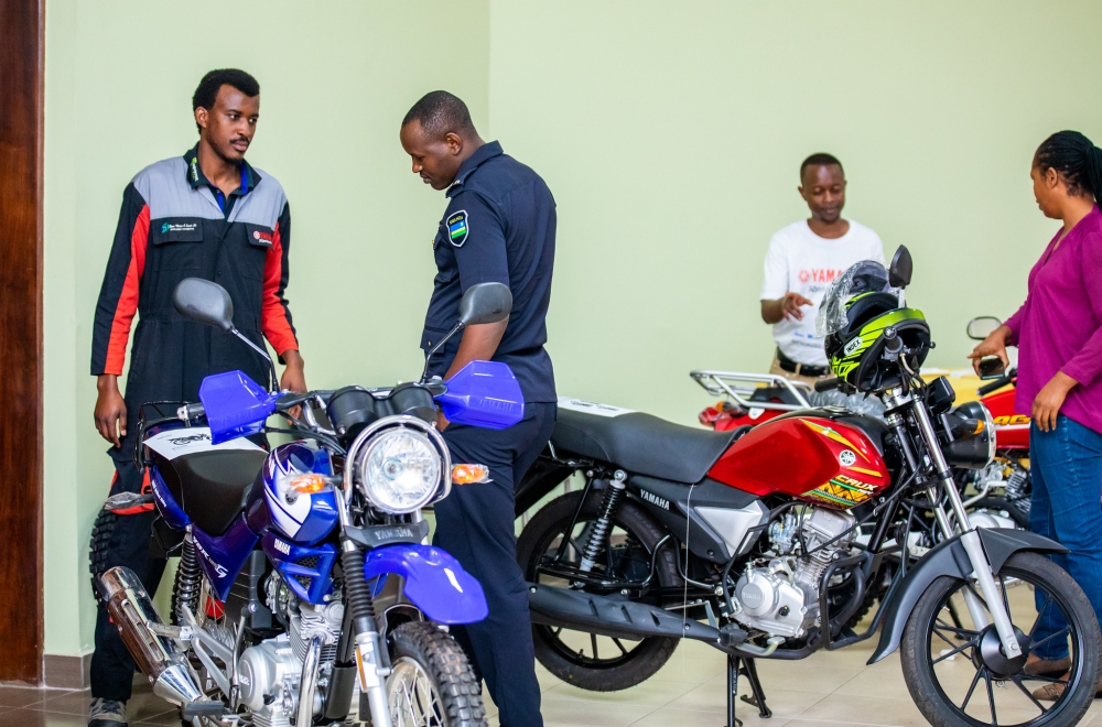 Visitors during a guided tour as they get some clarifications on the new brand of different products in Kigali on Tuesday December 6.  Yamaha Motor Company committed to continue to provide good services and products to Rwandan customers. All Photos by Olivier Mugwiza
