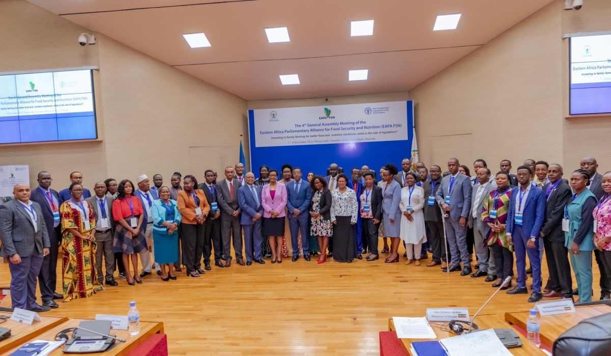 Legislators and officials from FAO pose for a group photo during the 4th General Assembly of the Eastern Africa Parliamentary Alliance for Food Security and Nutrition on Thursday, December 8, 2022 in Kigali (courte
