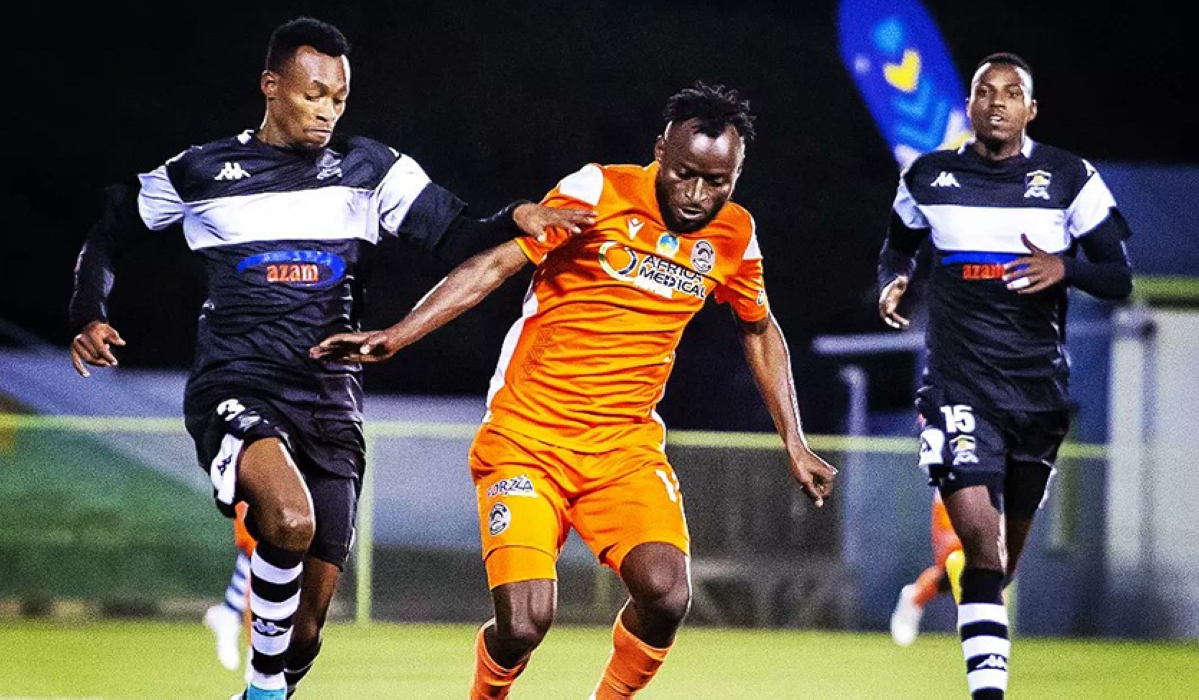 AS Kigali striker Shaban Hussein Shabalala wins the ball against APR FC defenders during a goalless draw at Kigali Stadium on December 8. Courtesy