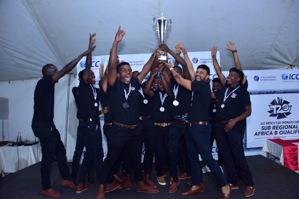 Tanzania National cricket team players with the trophy celebrate their qualification. Courtesy