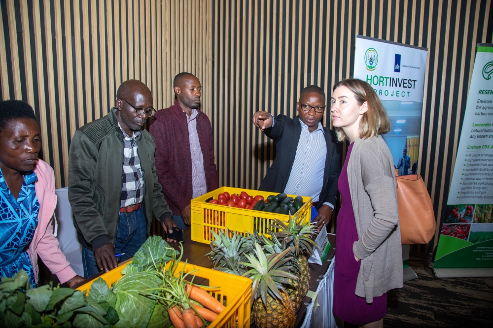 Beneficiaries showcase some agricultural products at a mini-exhibition during the event that was organized to share the project’s five-year journey on Friday, December 9, HortInvest supported 50 companies that contribute about 40 per cent of overall horticulture exports of Rwanda. All photos by Willy Mucyo 