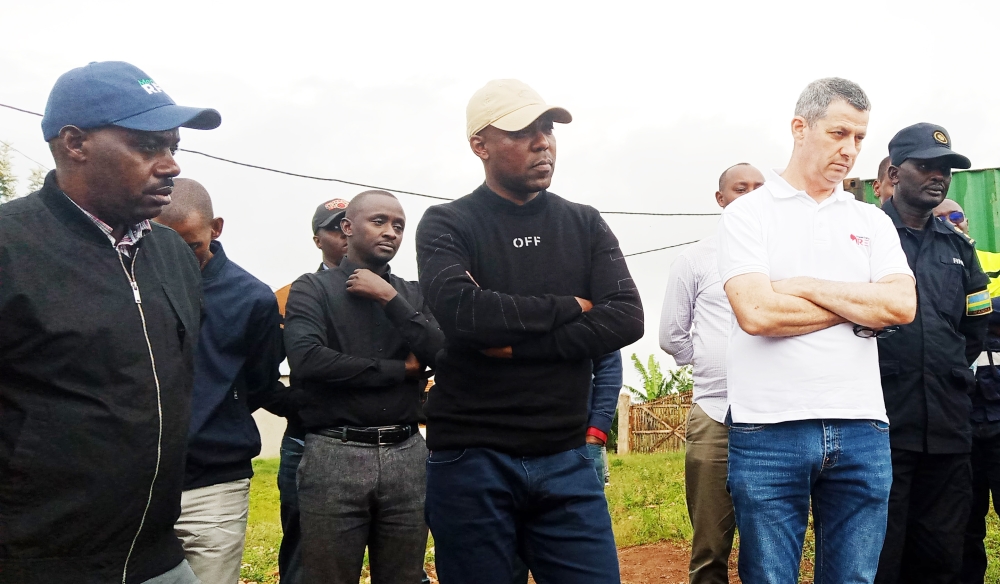 Minister of Infrastructure Ernest Nsabimana, (C) Rwanda Energy Group CEO Ron Weiss visit  at a solar plant in Kabarore sector, Gatsibo District. Photo by Emmanuel Nkangura