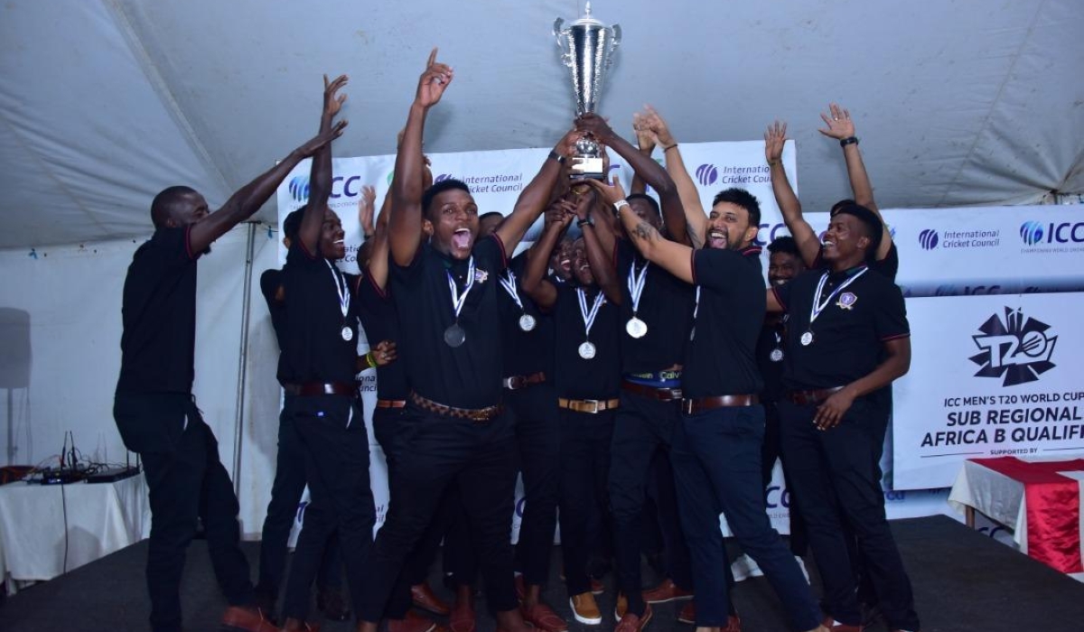 Tanzania National cricket team players with the trophy celebrate their qualification. Courtesy