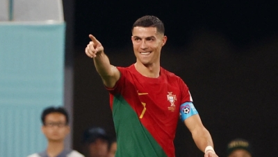 Portugal’s Cristiano Ronaldo celebrates after scoring against Ghana at the 2022 FIFA World Cup on November 24, making him the only player in history to have scored in five World Cups [Reuters/Hannah Mckay]