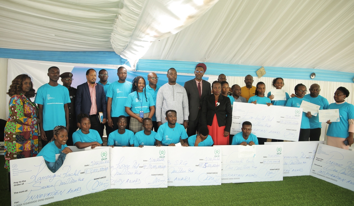 Winners and officials pose for a group photo as NIRDA has incubated and awarded eight business projects of young innovators that are adding value to cow products and cow by-products. Photo by Craish BAHIZI