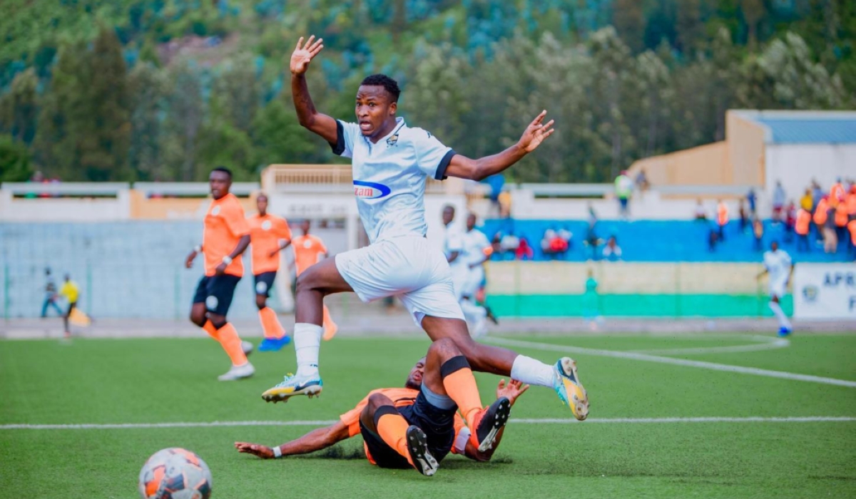 APR FC striker Lague Byiringiro wins the ball against Rutsiro defender during the game at Umuganda Stadium in Rubavu District. Courtesy