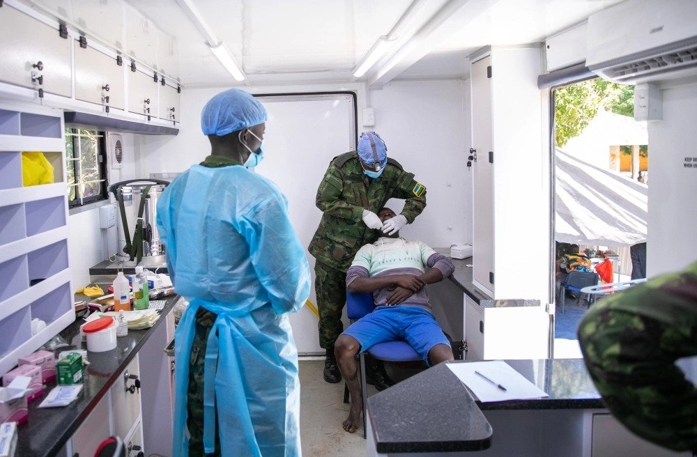 An RDF medical team undertake a dental procedure in  Cabo Delgado, Mozambique, where Rwanda deployed troops to help fight a terrorist group in July