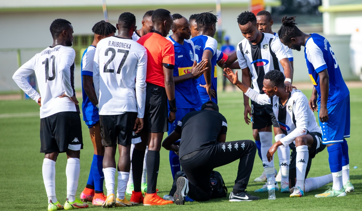 APR FC and Rayon Sports players during a past derby at Kigali stadium . Olivier Mugwiza