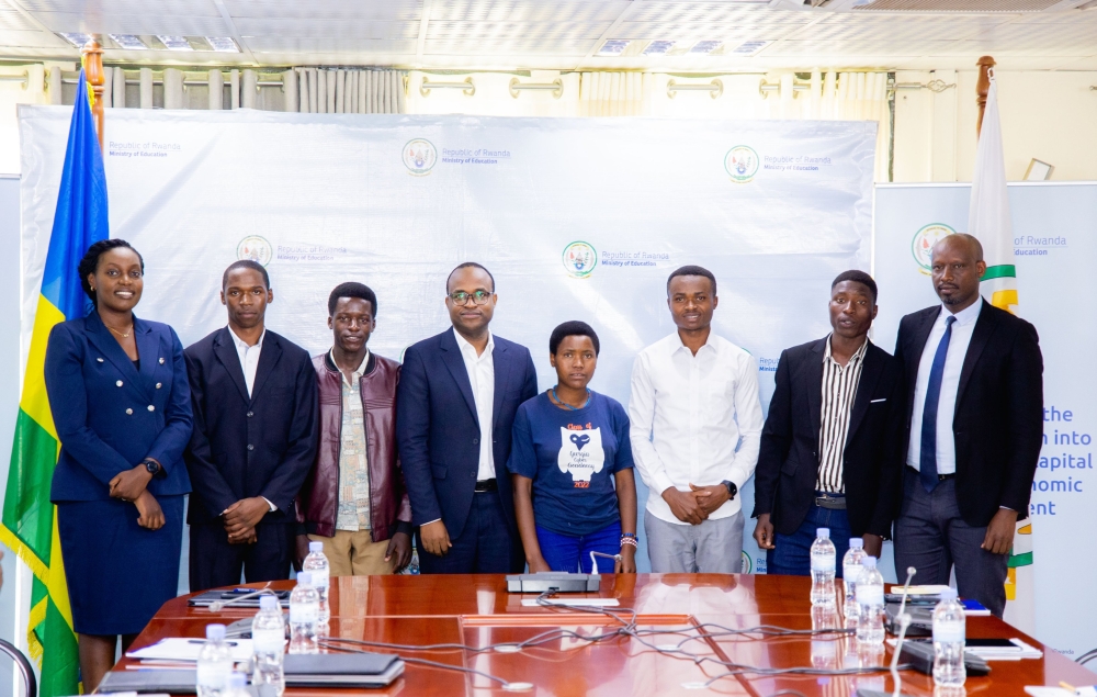 Best performers in TTC, Frank Kimenyi from TTC Save, Donat Uwamahoro from TTC Mururu,Chantal Uwamaliya from TTC Save, Olivier Niyomungeli from TTC Rubengera in group photo with officials during the event to officially release national exam results in Kigali on December 15. Courtesy