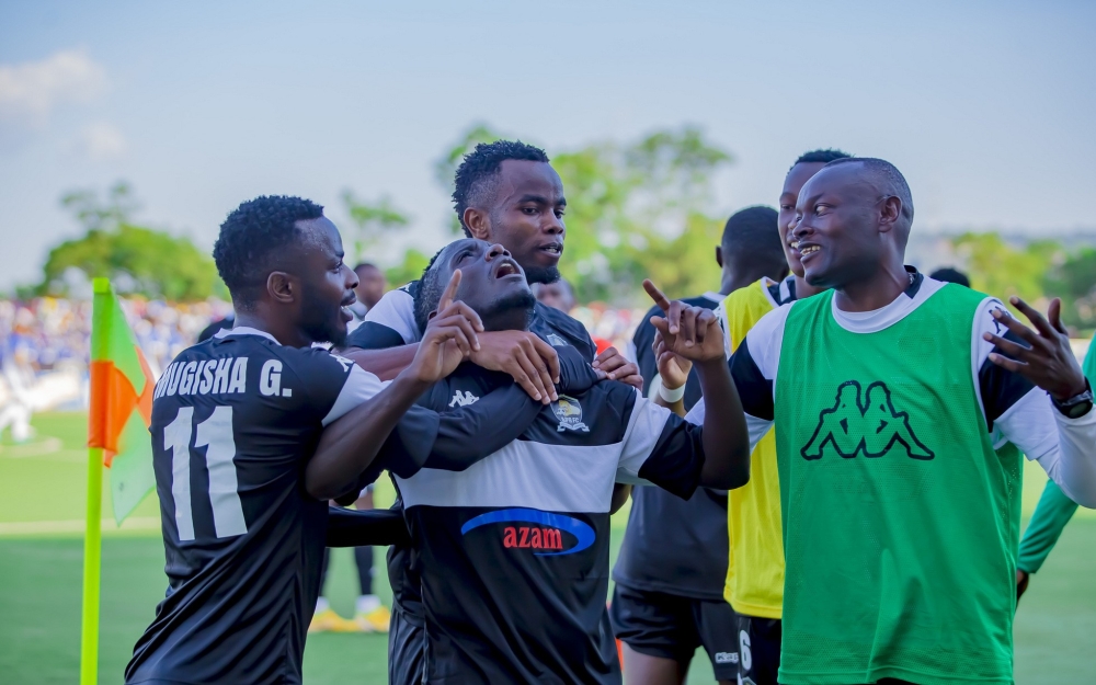 APR FC players celebrate the win after stunning the Blues 1-0 at Kigali stadium on Saturday, December 17. Photo by Christophe Renzaho 