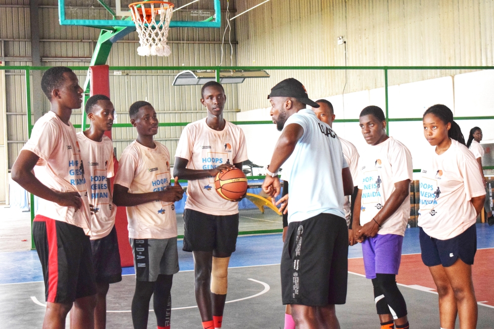 Participants follow Innocent Kwizera, the basketball coach&#039;s instructions during a training session on Monday, December 19. The camp is taking place at STECOL Masoro from Monday, December 19 and will run until Thursday, December 22. Courtesy