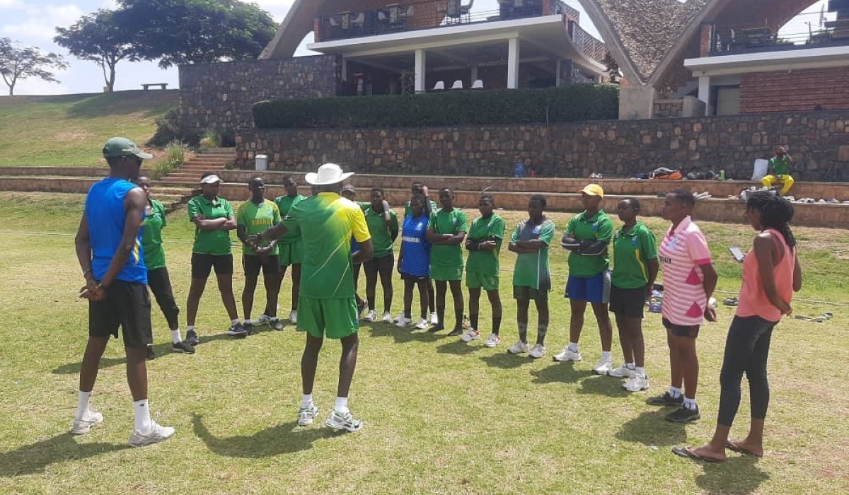 The Rwanda national U19 Cricket head coach Leonard Nhamburo talks to his players during a recent session. Photo: Courtesy.