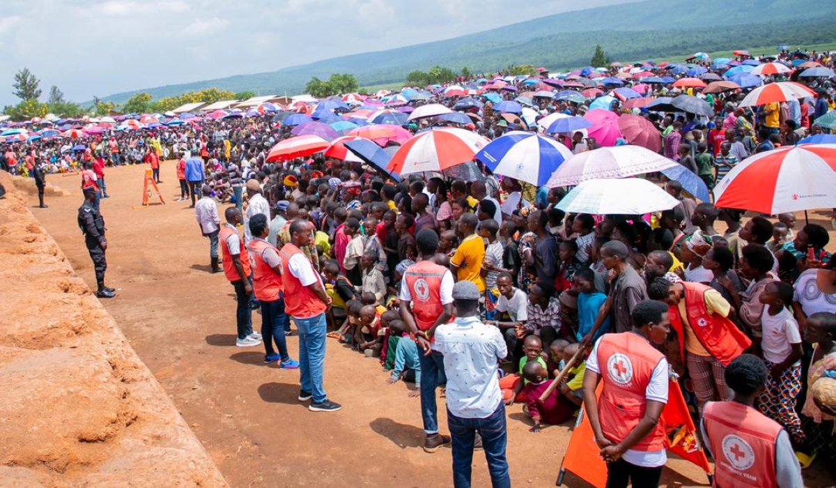 Thousands of Burundian refugees who live in Mahama camp in Kirehe District during a meeting with the delegation from Burundi which is in Rwanda to sensitize refugees to repatriate voluntarily, on Tuesday, December 20 . Mahama refugee camp hosts 38,000 Burundian national