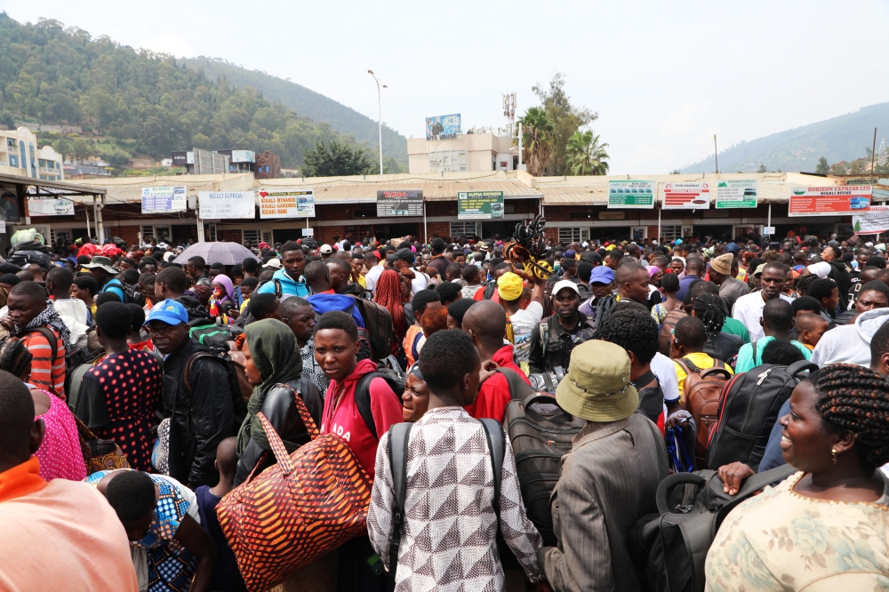 Commuters look so disappointed as they are stranded at Nyabugogo Taxi Park while heading upcountry to celebrate Christmas with their families, on Saturday, December 24. All Photos by Craish Bahizi