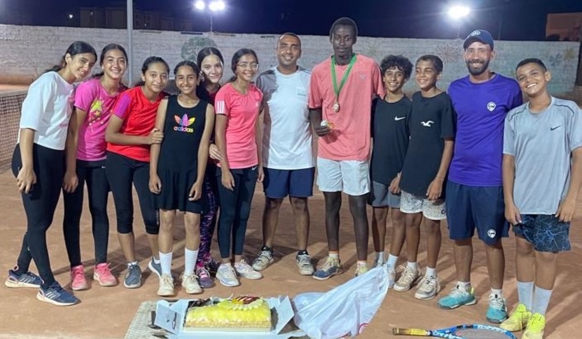 A group photo of Mugisha with former teammates in Extreme Tennis Academy in Egypt.