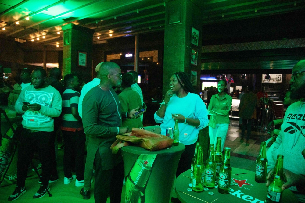 Clients at one of pubs in Kigali. consumers that beverages such as Heineken, soft drinks, Primus, Mutzig, Turbo King, and Legend drastically increased two weeks ago. Dan Kwizera
