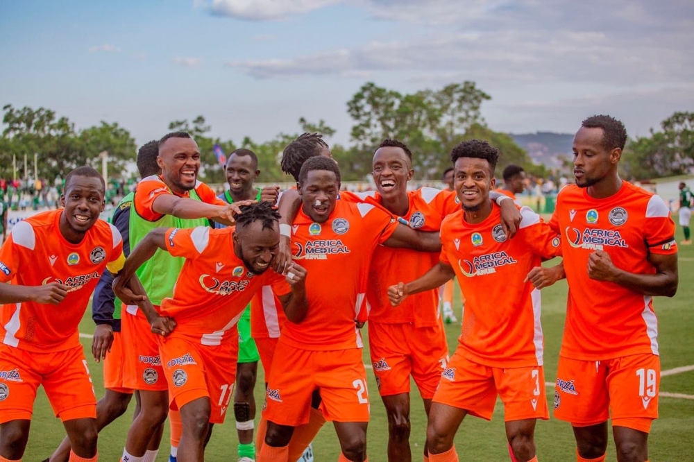 AS Kigali players celebrate a goal during a recent match against SC Kiyovu at Kigali Stadium.