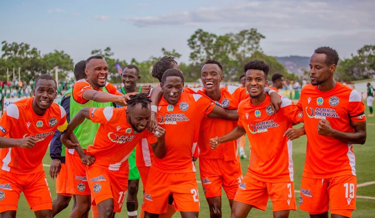 AS Kigali players celebrate a goal during a recent match against SC Kiyovu at Kigali Stadium.