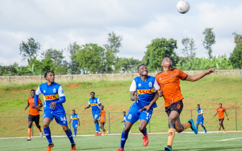 Rayon Sports right-back Axcel Iradukunda vies for the ball with Bugesera striker at Bugesera stadium.Due to the construction activities to revamp Kigali Stadium, all league games will take place in Bugesera stadium.