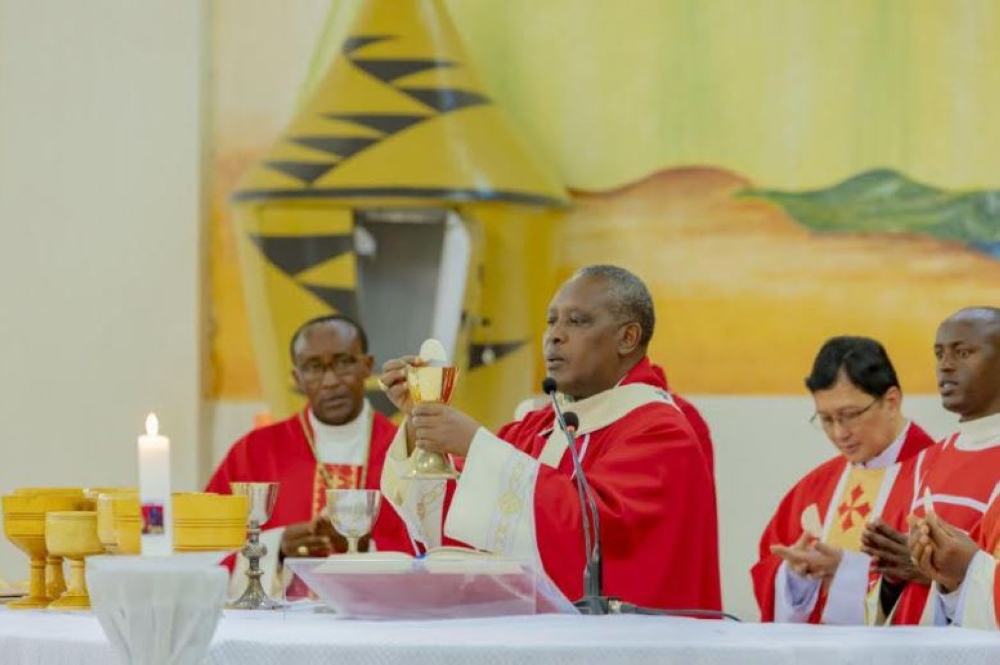 Cardinal Antoine Kambanda leads the Holy Communion mass to pray for late Pope Benedict XVI at Regina Pacis Remera on Thursday, January, 5